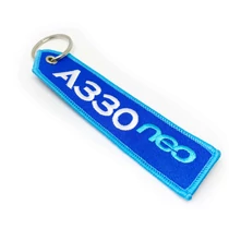 Gestickte Schlüsselanhänger mit dreifarbigem Druck